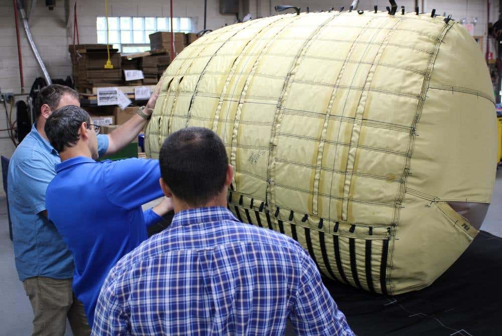 NASA engineers inspecting